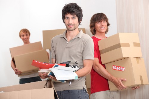 Professional movers packing items