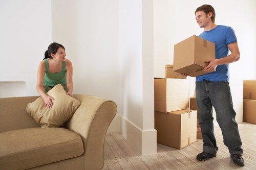 Professional movers loading a van in Millhill